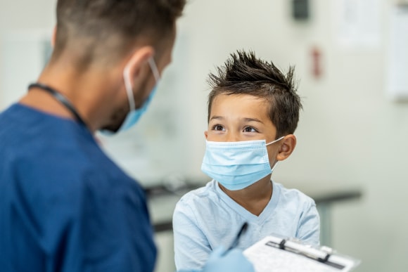 Photo of boy at appointment.