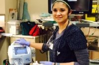 Bronson respiratory care team member smiling wearing scrubs.