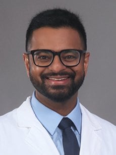 Headshot of Dr. Hari Nair, medical oncologist, smiling at the camera.