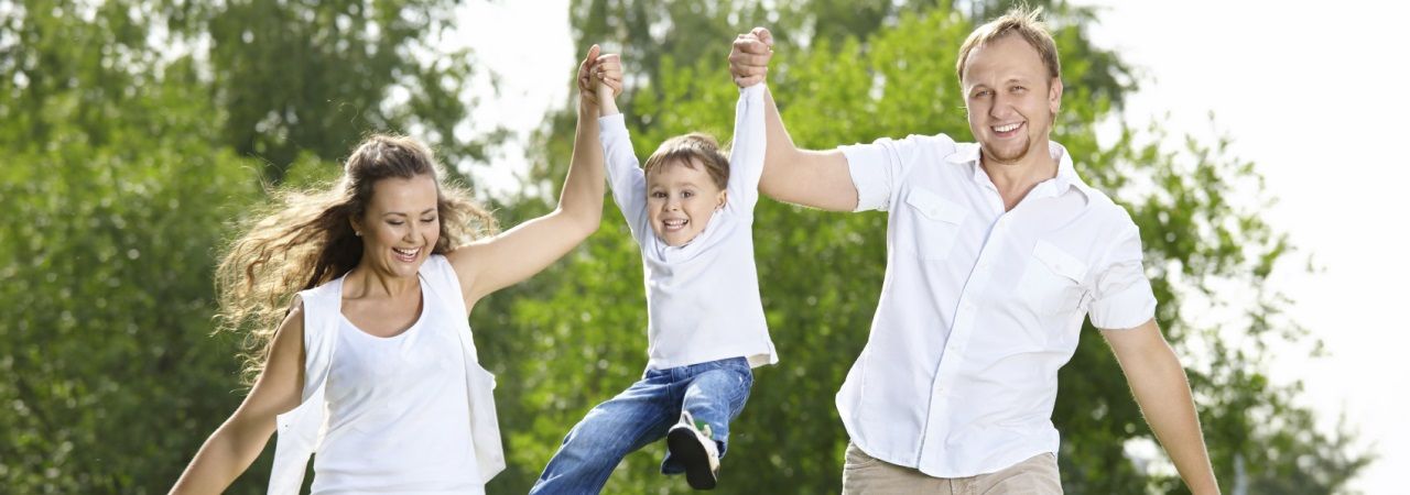 Photo of a couple and child.