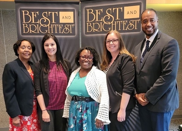 Photo of Team Bronson accepting the Best and Brightest award in Grand Rapids Michigan - photographed from left to right is Cheryl Johnson, Seena Menon, Elishae Johnson, Kristan Rudd and Marcus Glass.