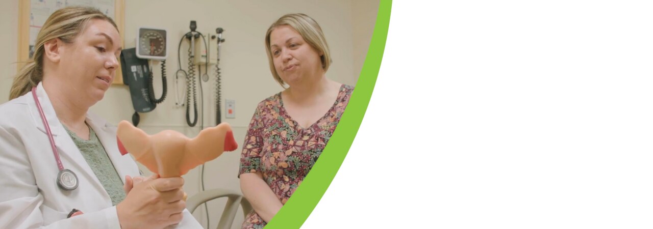 Certified nurse midwife, Amanda Ezekiel, speaks with a patient at her annual exam appointment.