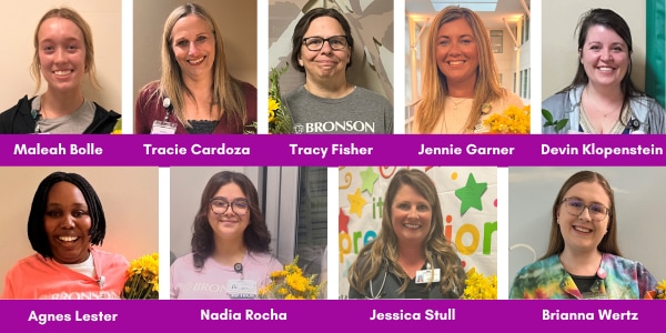 Bronson's 2024 Sunshine Award winners smile while holding their awards and flowers.