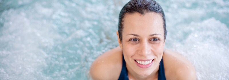 women in a hot tub.