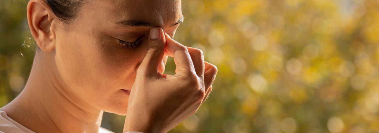 Photo of headache young woman.